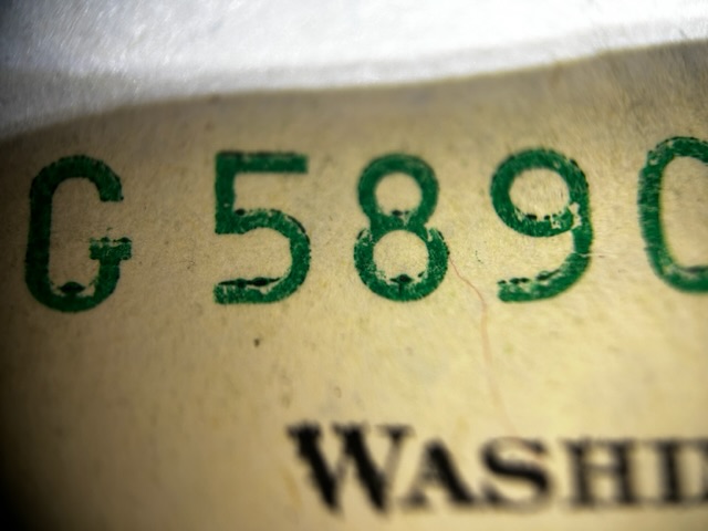 Series-2009-One-Dollar-Bill.-Over-Inked-Serial-Number?