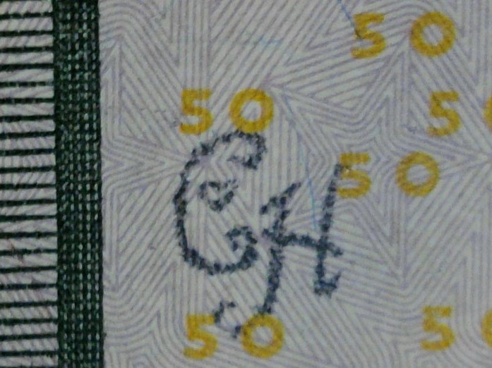 2013-$50.00-Bill-With-Strange-Writing-On-The-Reverse.