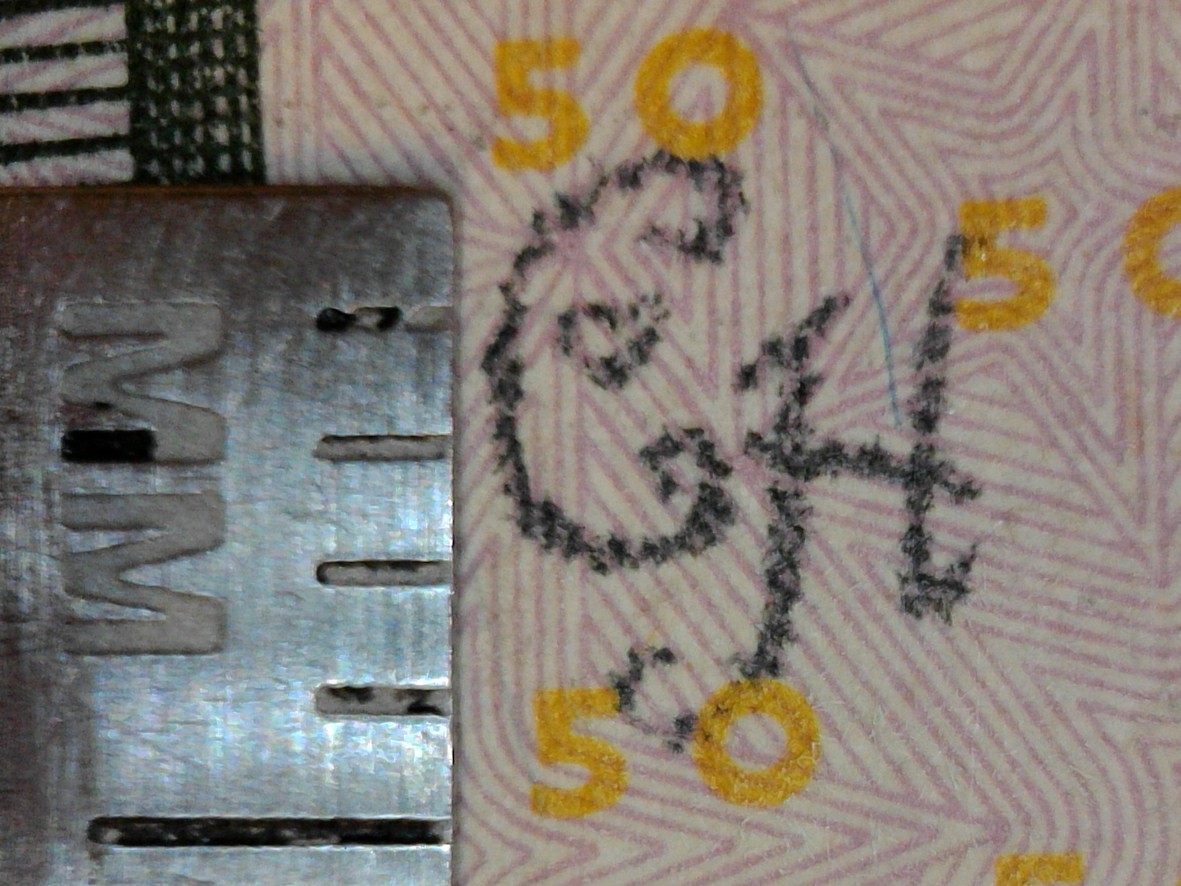 2013-$50.00-Bill-With-Strange-Writing-On-The-Reverse.