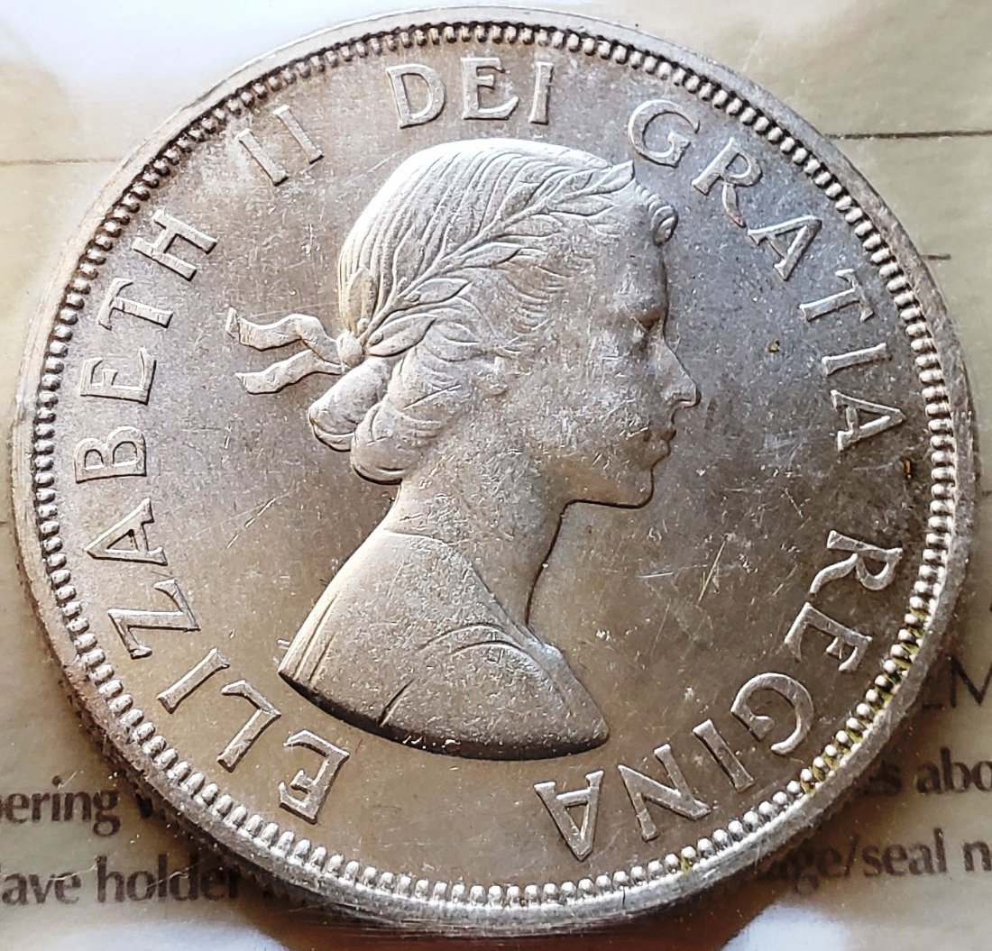 Guess-This-ICCS-Grade-For-1964-Canada-Dollar-: