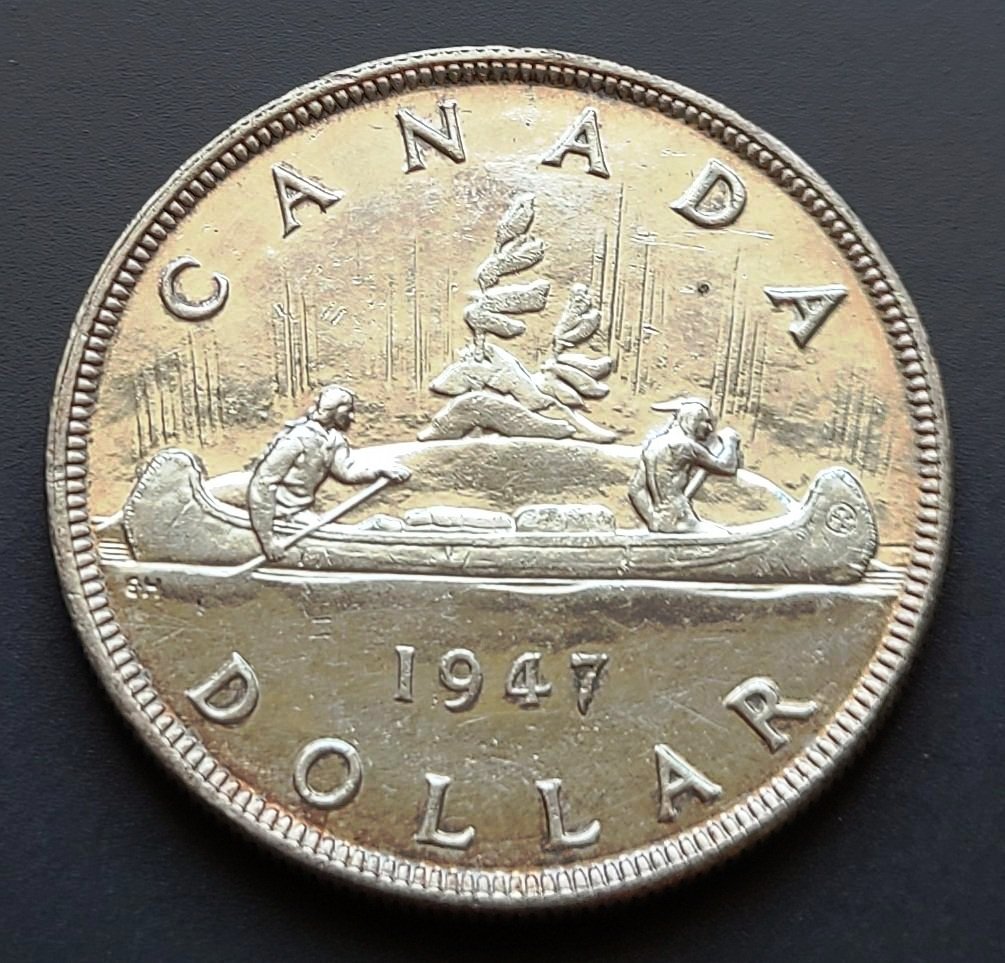 Grading-On-This-1947-Pointed-7-Silver-Dollar