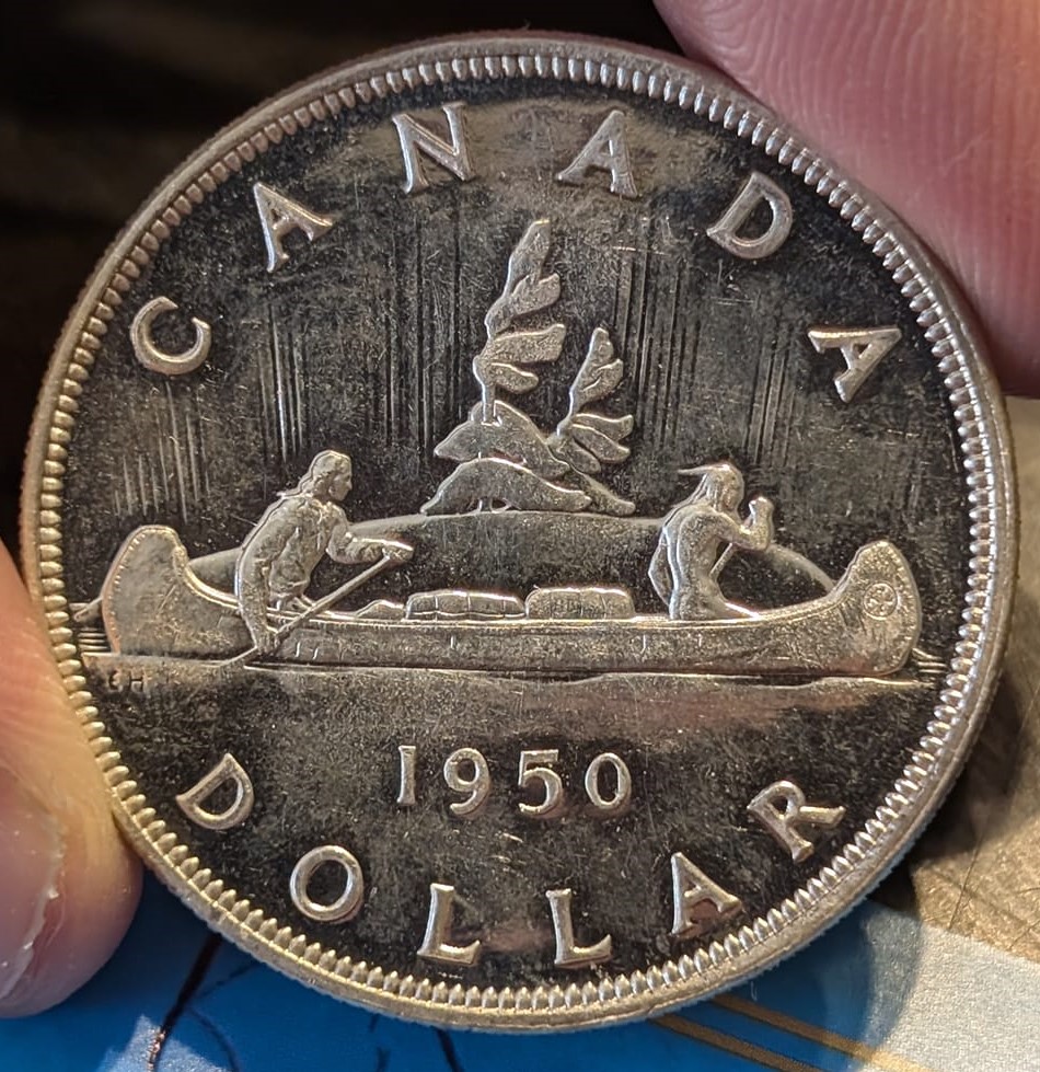 1950-Dollar:-Is-This-Considered-A-Cameo-Coin?-Grade-Please.