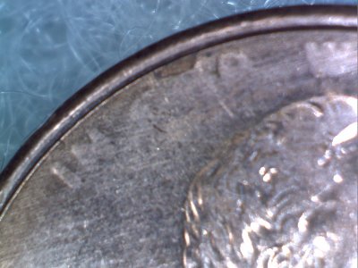 2000-P-Lincoln-Penny-Struck-Through-Grease?