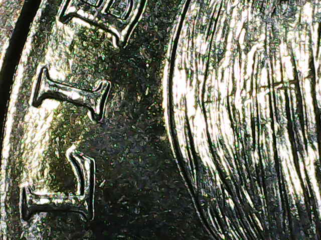 2002-D-Sacagawea-Dollar-From-Mint-Set-Error-Across-Sacagawea's-Face.-Is-It-A-Die-Crack-Or-Gouge?