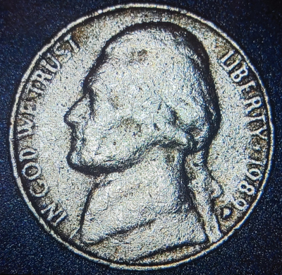 Curious-If-This-1989-P-Nickel-Is-Environmental-Or-A-Possible-Mint-Anomaly?