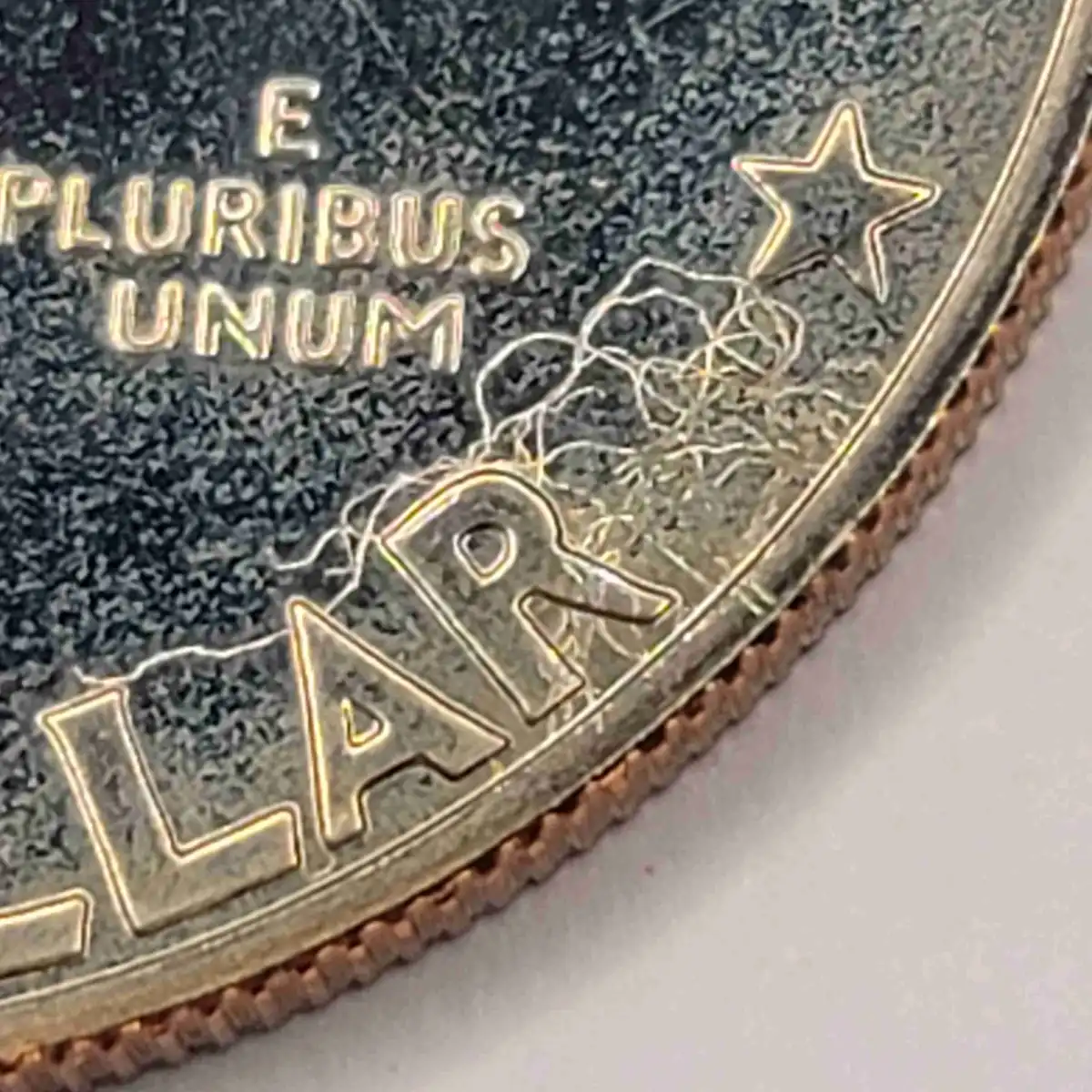 1976-S-Proof-Eisenhower-Dollar-Struck-Thru?