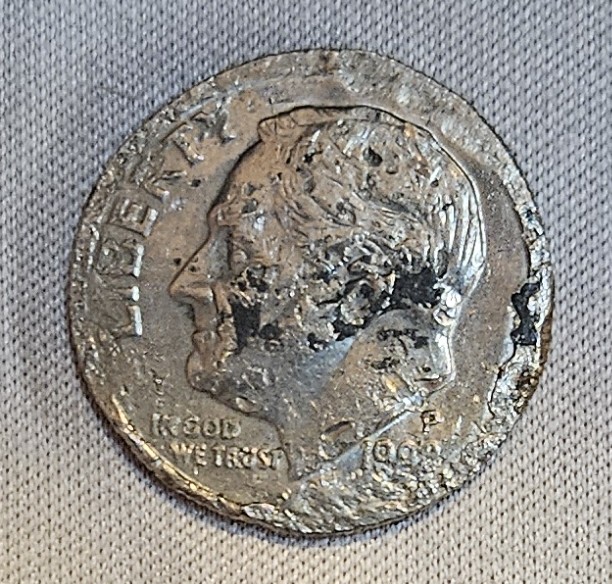 Tell-Me-What-Someone-Did-To-This-1998?-Roosevelt--Dime?