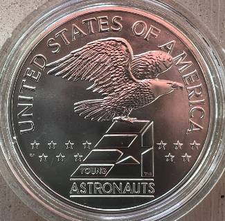 Post-A-Coin-Or-Medal-Related-To-Space-Travel.