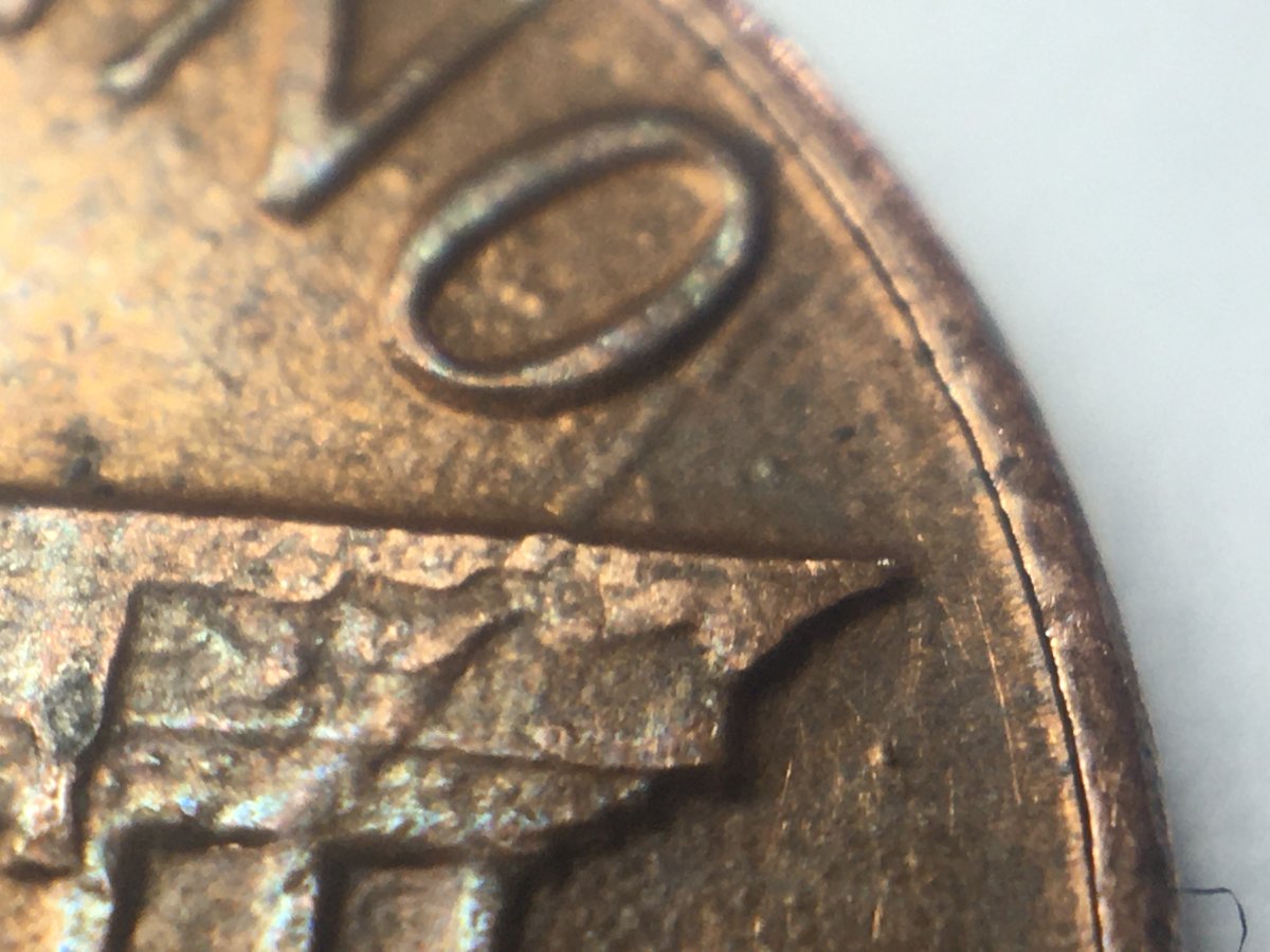 1984-D-Reverse-Strange-Raised-Line-Going-Across-Diagonally
