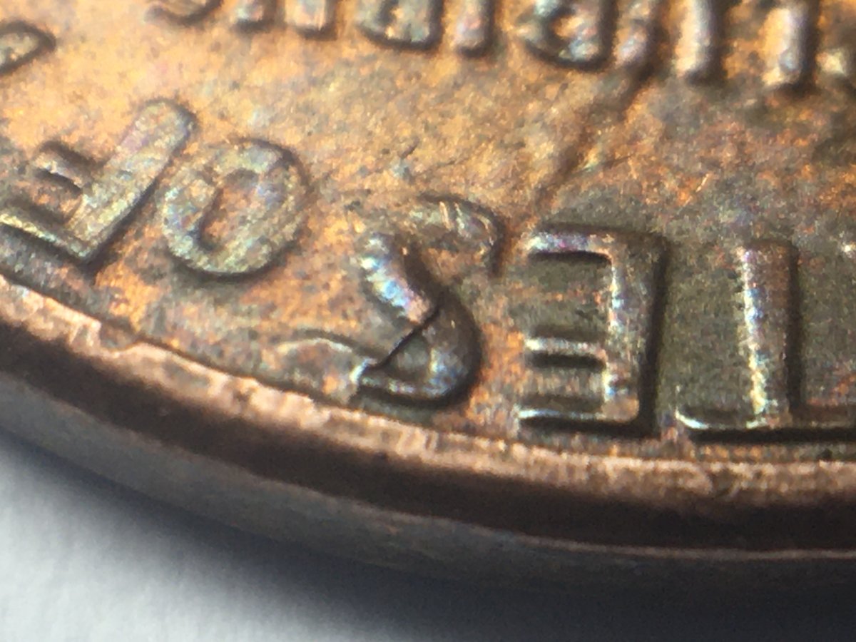 1984-D-Reverse-Strange-Raised-Line-Going-Across-Diagonally