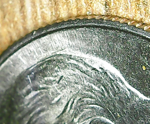 2015--P-Dime,--Obverse-Struck-By-Some-Other-Coin-Die?