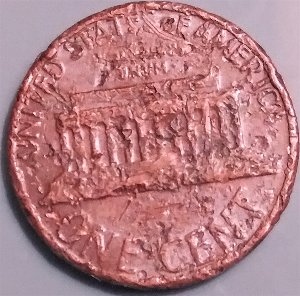 1981-Lincoln-Memorial-Cent,-Wondering-If-This-Happened-Before-Or-After-It-Was-Made.