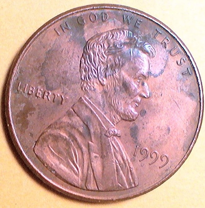 1999-Penny-With-Wide-AM-In-Damaged--Shape