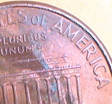 1999-Penny-With-Wide-AM-In-Damaged--Shape