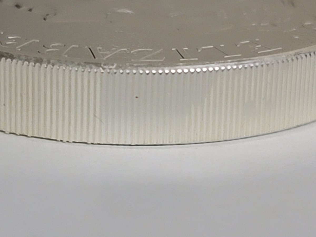 Is-It-Normal-For-A-Coin's-Edge-To-Be-White?