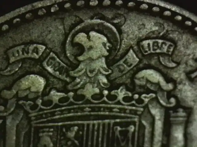 A-1962-Una-Peseta-Coin-That-Has-A-Strange-Marking/Overstrike-On-The-Reverse-Side-Of-The-Coin.
