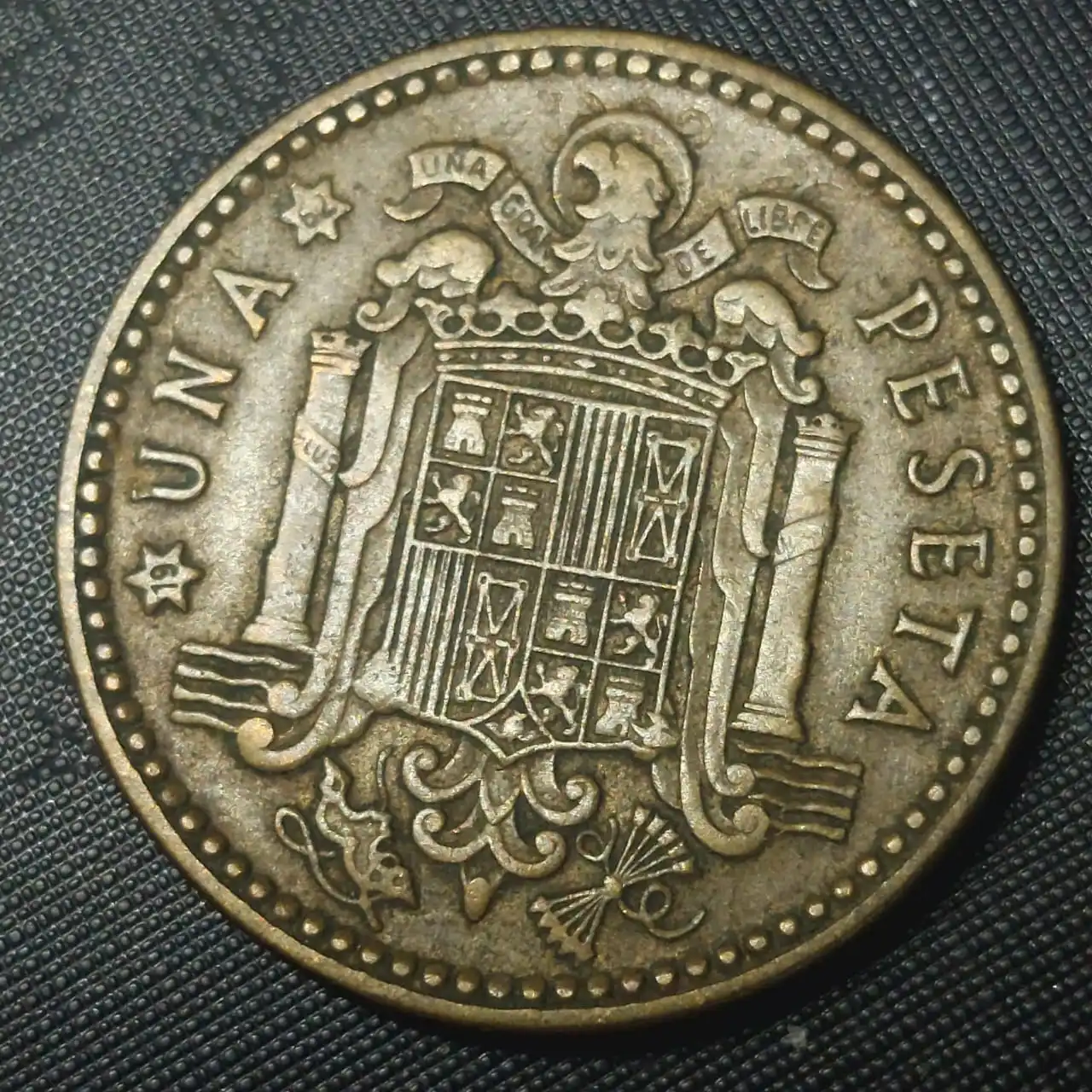 A-1962-Una-Peseta-Coin-That-Has-A-Strange-Marking/Overstrike-On-The-Reverse-Side-Of-The-Coin.