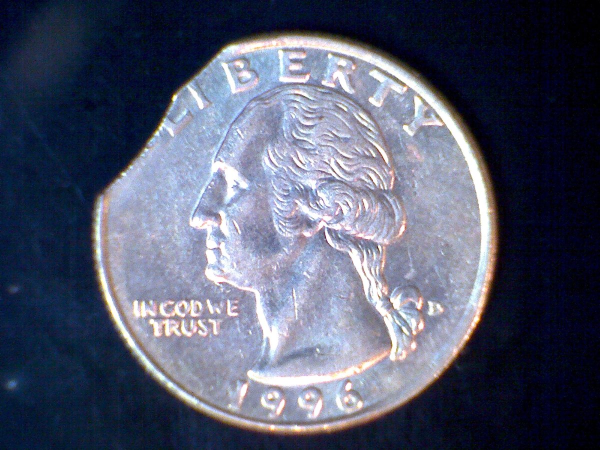 1996-Quarter,-Looks-Like-2-Curved-Clips-In-Same-Clip