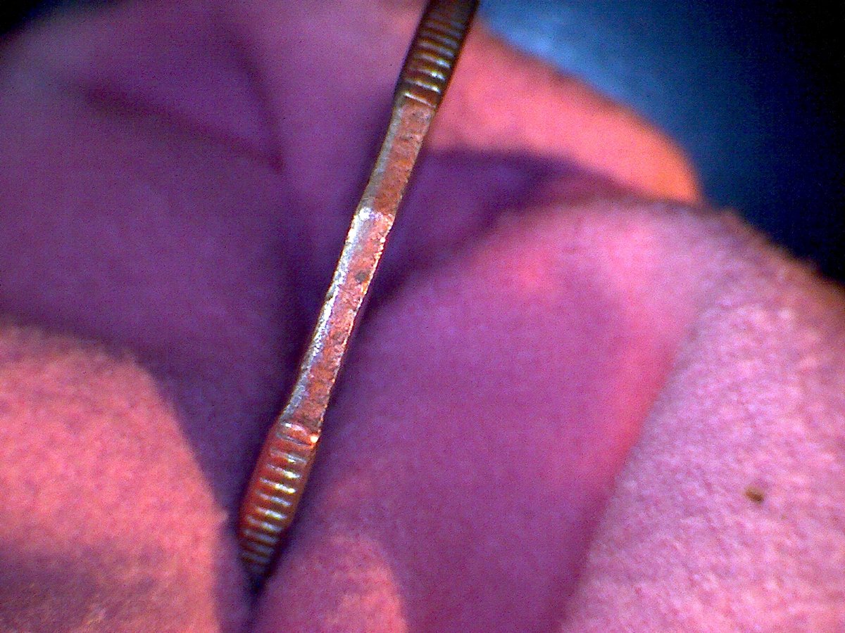 1996-Quarter,-Looks-Like-2-Curved-Clips-In-Same-Clip