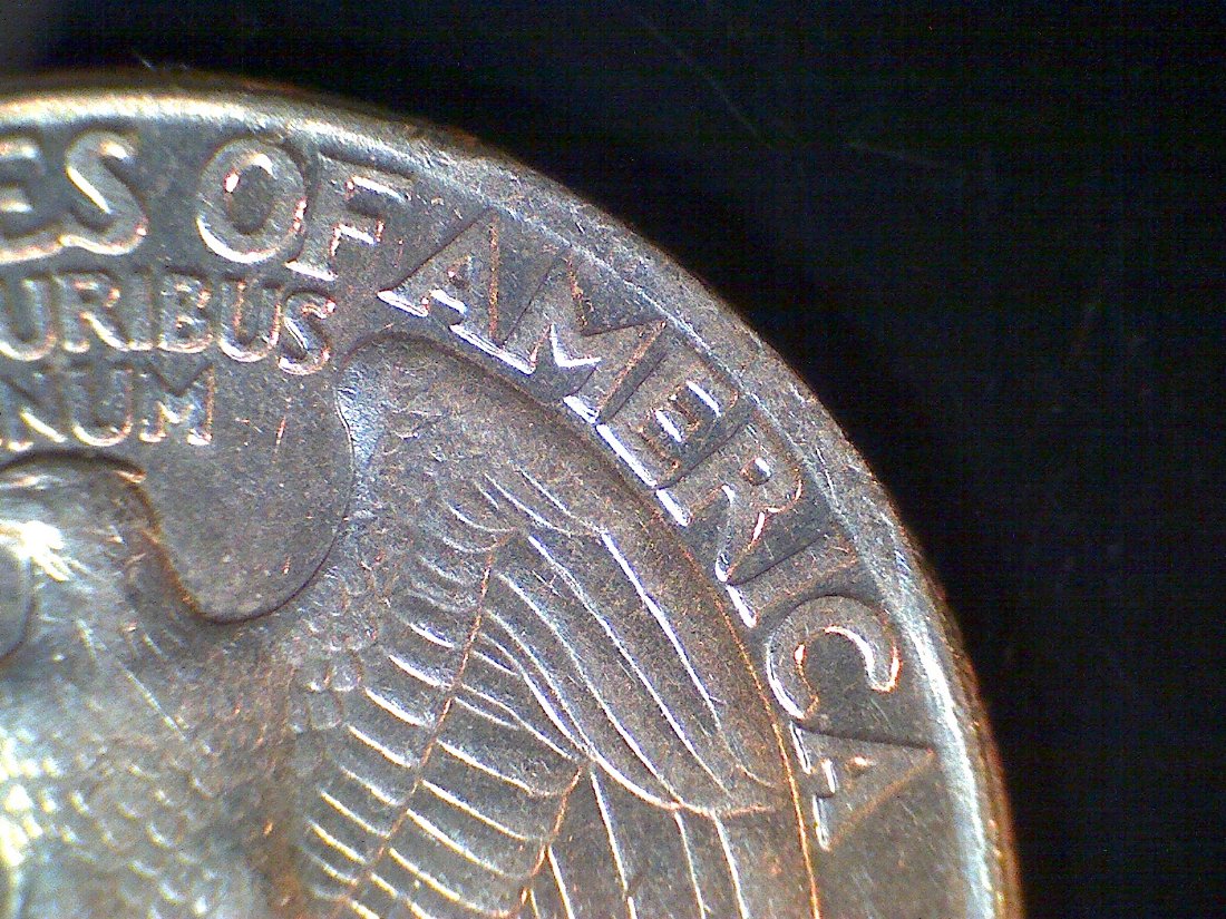 1996-Quarter,-Looks-Like-2-Curved-Clips-In-Same-Clip