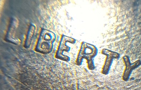Is-The-Word-God-Doubled-On-This-Coin?-Lmc