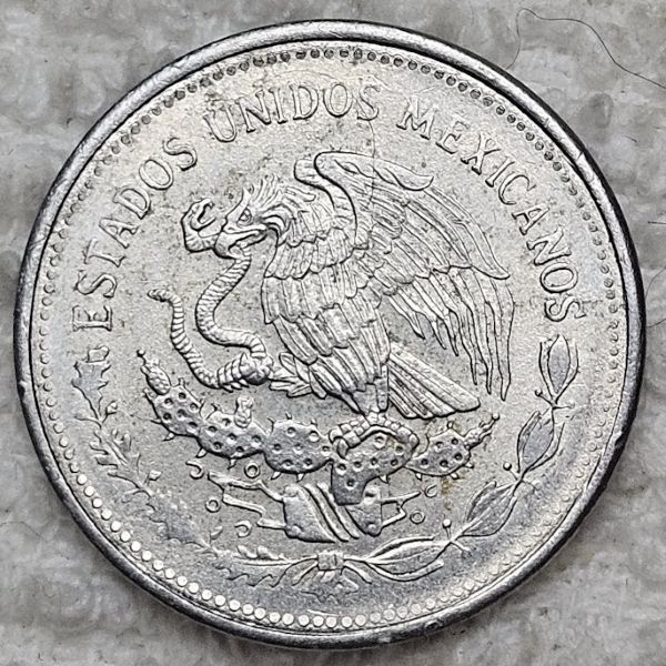 Post-Your-Coins-And-Medals-Featuring-A-Snake.