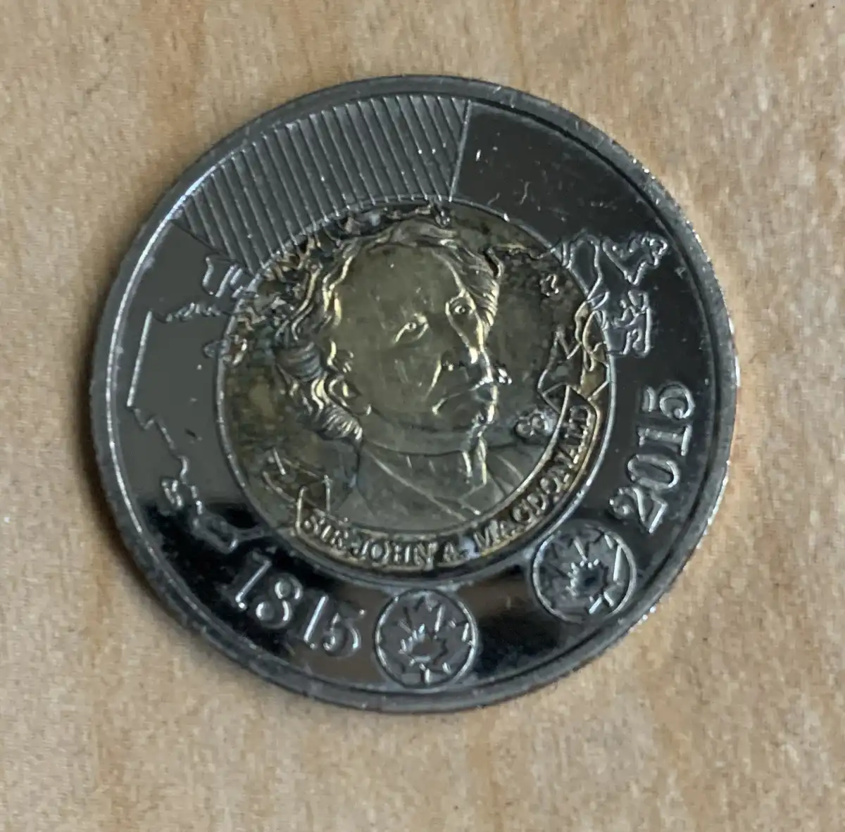2015-Double-Date-Sir-John-A-Macdonald-Toonie-With-RCM-Logo-On-The-Obverse