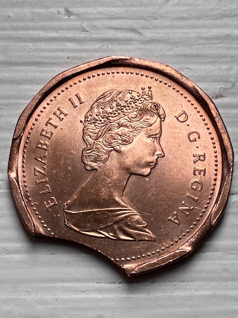 Picked-This-Triple-Clip-Cent-Out-Of-A-Junk-Box.