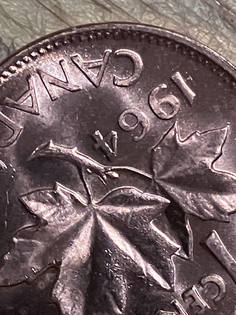 Is-This-A-1964-Extra-Spine-Cent?