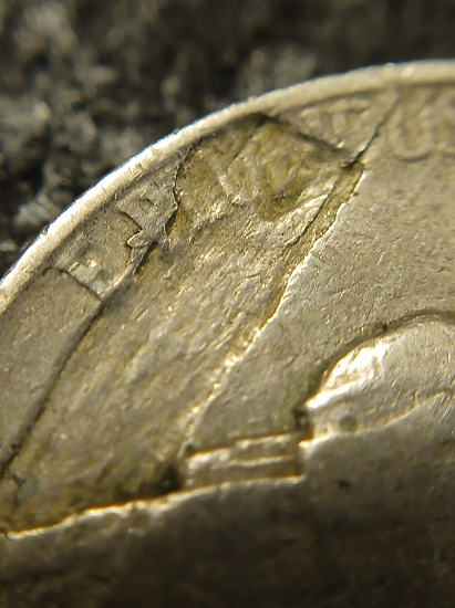 1942-Jefferson-Nickel?-Strike-Thru?