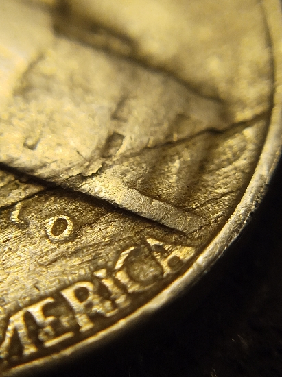 1942-Jefferson-Nickel?-Strike-Thru?