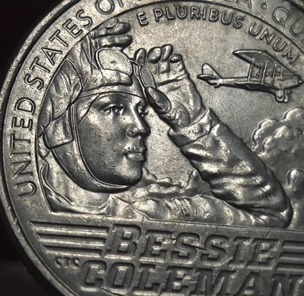 2023-Bessie-Coleman-Quarter-/What-Causes-These-Scratches-Behind-The-Design?