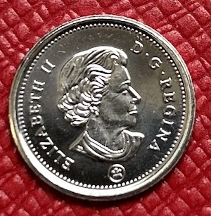 What-Are-The-Grades-Of-Thes-Three-Dimes?