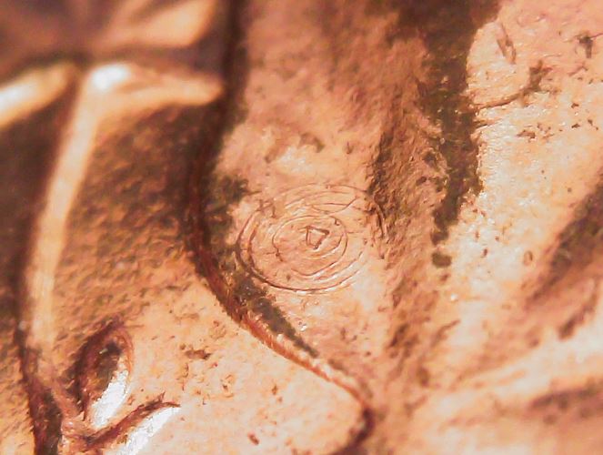 1966-Cent,-Odd-Circle-On-Leaf?