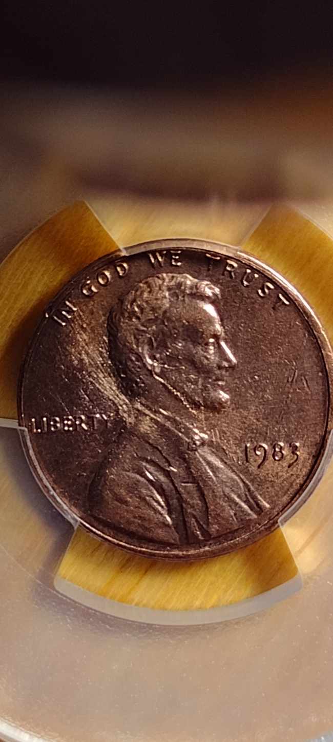 1983-Lincoln-Cent-With-Wire-In-His-Ear-And-Down-To-The-Date