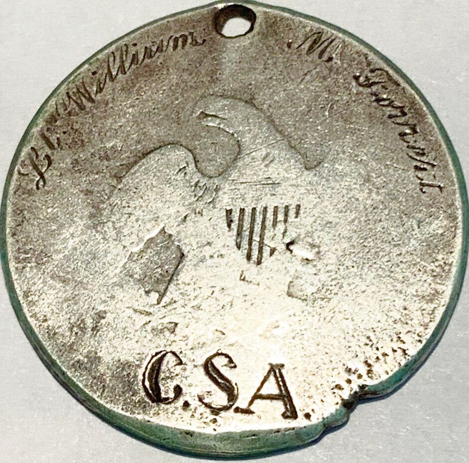 Looks-Like-Some-Buyer-Will-Get-Stung-On-This-Alleged-Csa-Dog-Tag-On-An-Alleged-1862-S-Half-Dollar