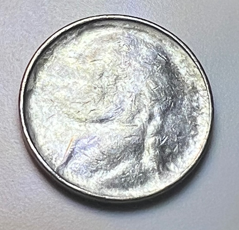Jefferson-Nickel-With-No-Face-Or-Date.-Reverse-Is-Legible.-Ideas?