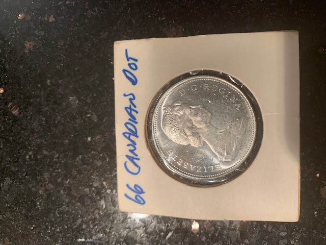 1966-Dollar-Dot-Under-Feather?