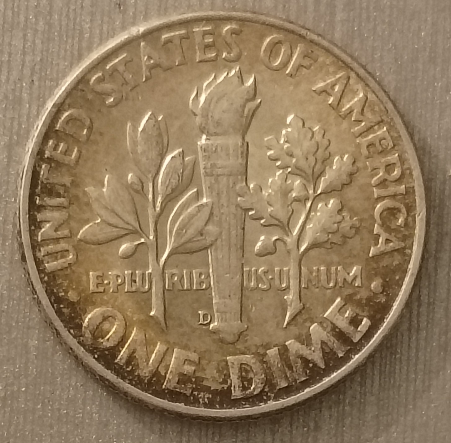 1963-Dime-No-Mint-Mark-On-Obverse-But-There's-A-D-At-The-Bottom-Of-The-Torch-On-The-Reverse