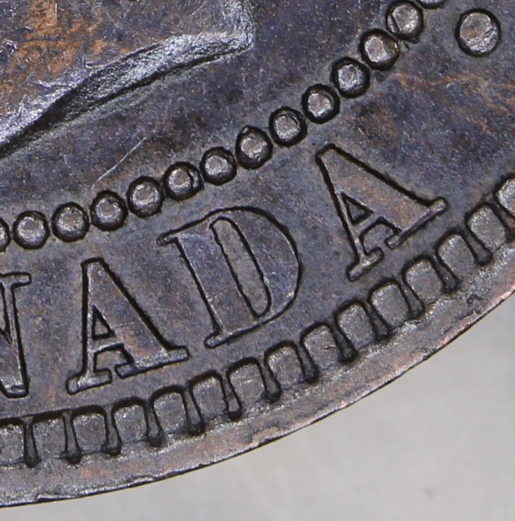 1899-Vickie-Large-Cent-Triple-Punched?