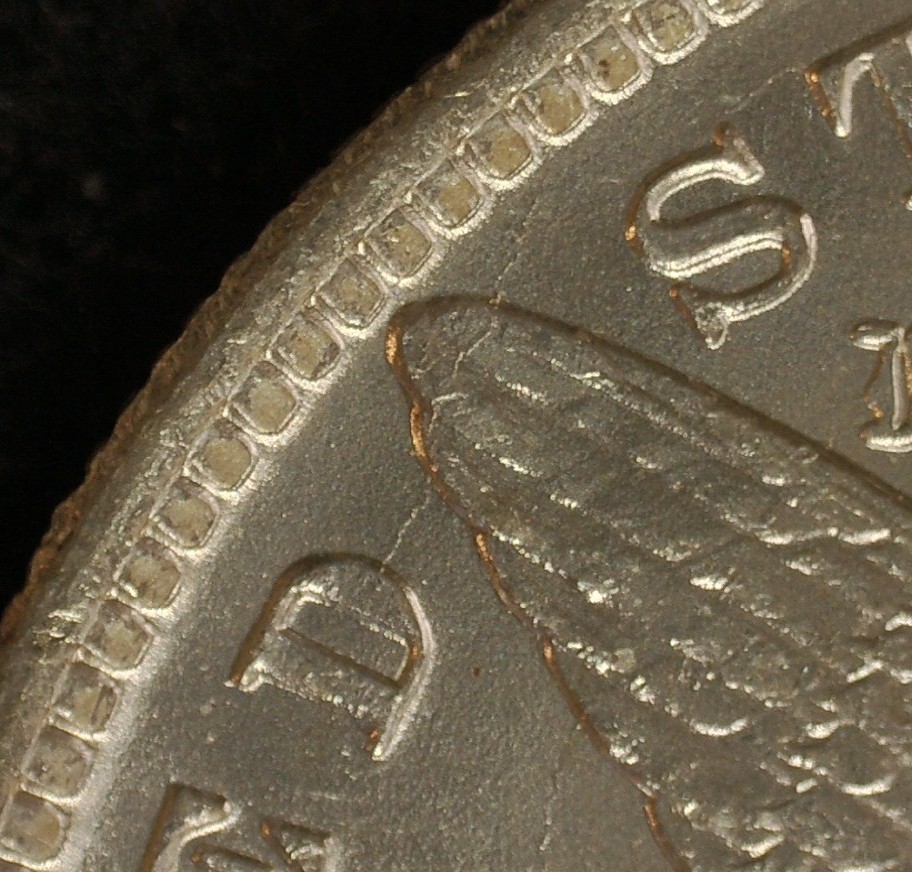 1884-O-Morgan-With-Die-Cracks-On-Reverse-And-Weak-Strike