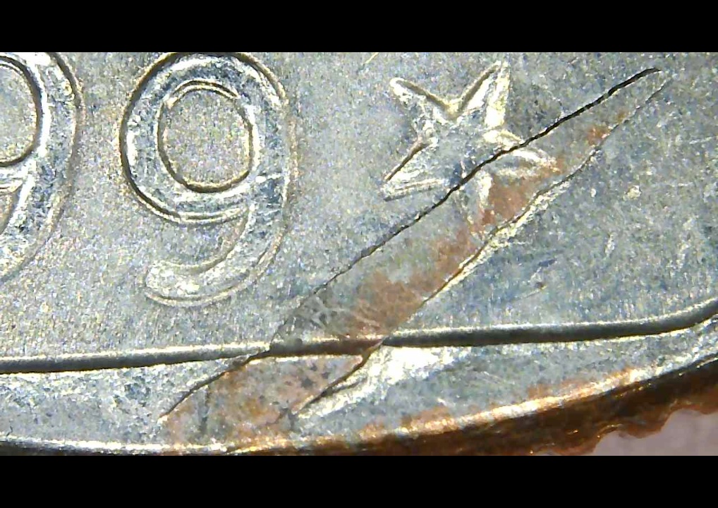 1999-P-Susan-B-Anthony-Struck-Through-Debris?