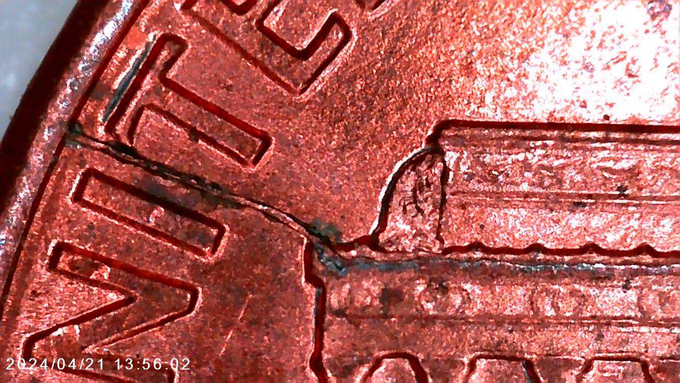 1992-LMC-With-Die-Break-&-Chip-Or-Plating-Blister?
