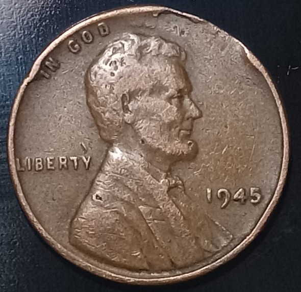 1945-Wheat-Penny.-Is-This-Damage-Or-Something-More?