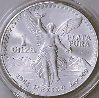 Post-Your-Coins-And-Medals-Featuring-A-Snake.
