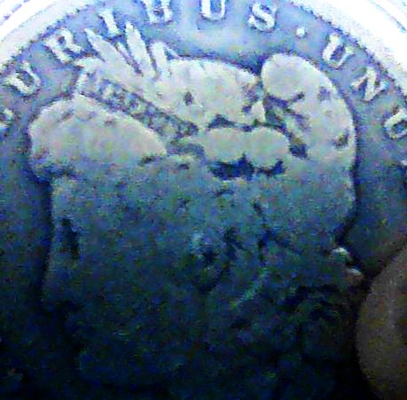 1899--Micro-O-Morgan-Dollar-Strike-Error-On-Headband