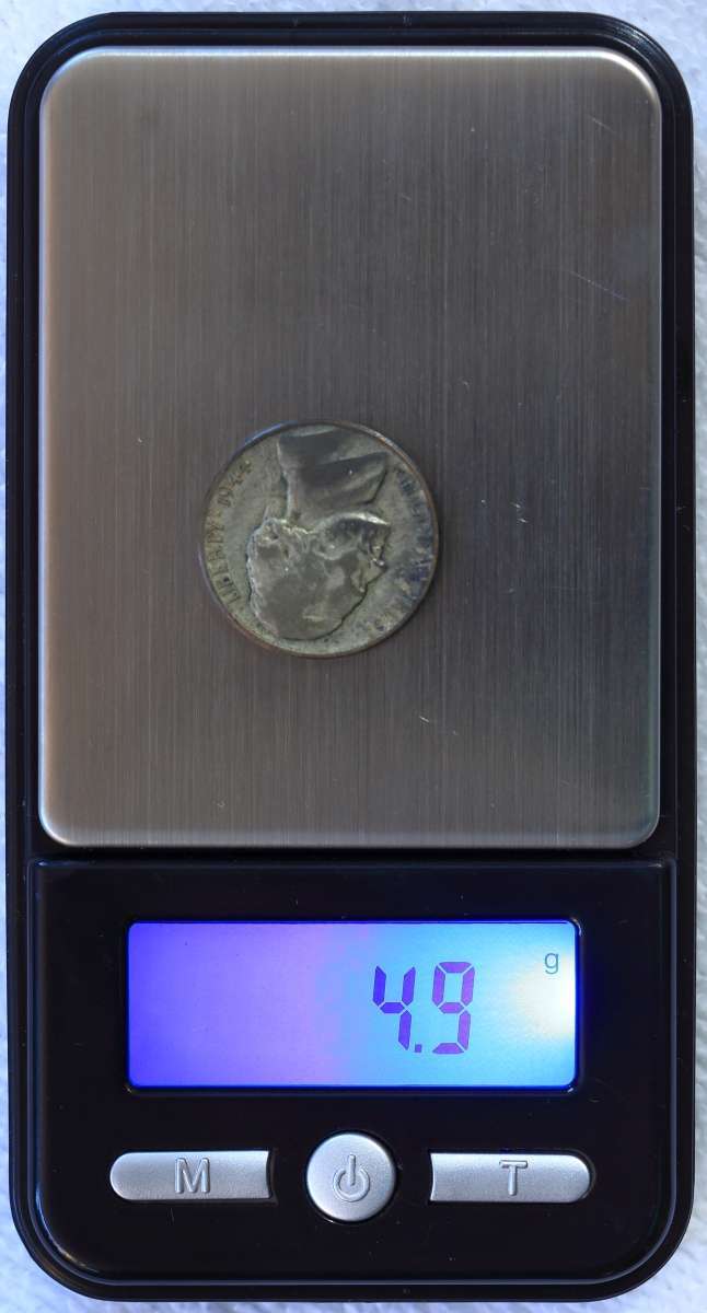 An-Authentic,-Genuine-And-Counterfeit-Henning-Nickel.