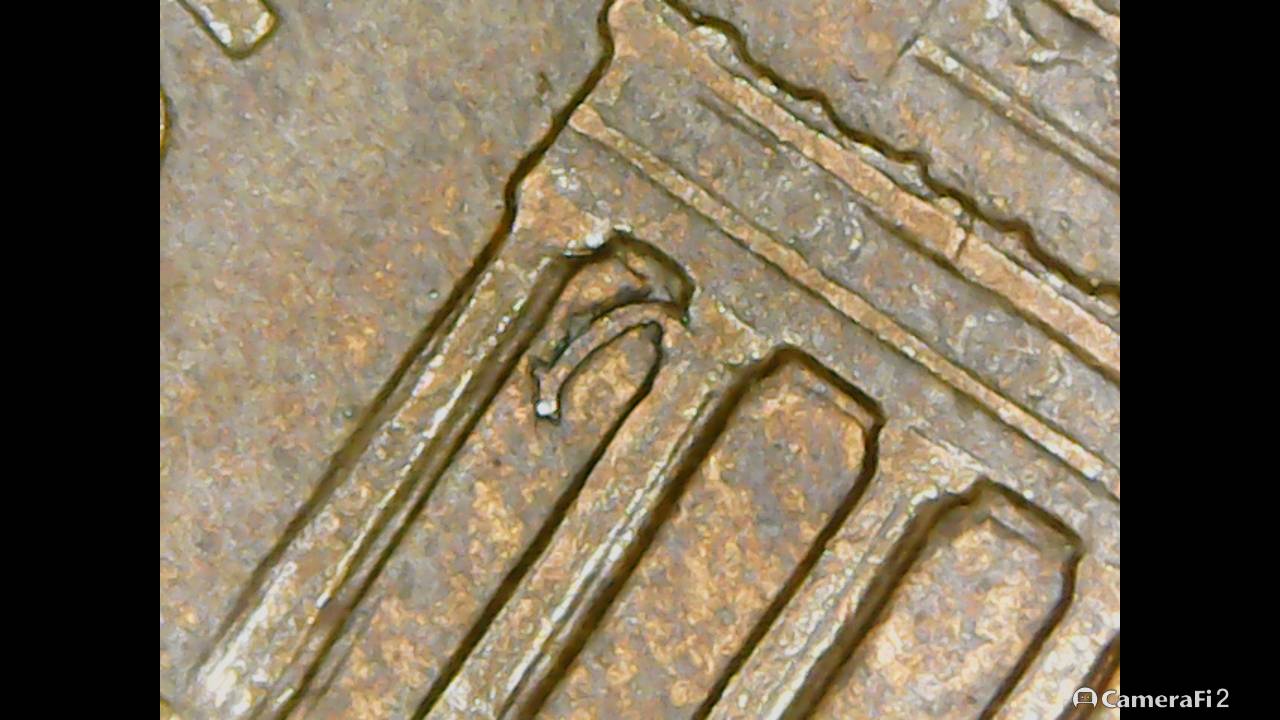 1999-Penny-With-A-Mark-I-Have-Not-Seen-On-Far-Left-Between-The-Columns..