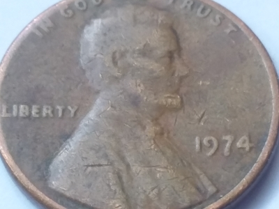 1974-Penny-Struck-Through-Grease-Or-Wear-And-Tear-Damage?