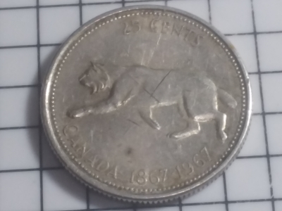 1967-Bobcat--Commemorative-25-Cent-Exceeds-Tolerance!